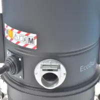 Close-up of the ECOBULL industrial vacuum tangential suction inlet and manual filter-shaker control.