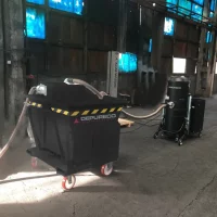 Depureco TX 400 industrial vacuum connected to a large mobile pre-separator for high-volume material collection.