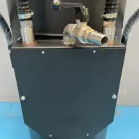 Depureco WD AIR liquid discharge valve and hose connections on the rear service panel.