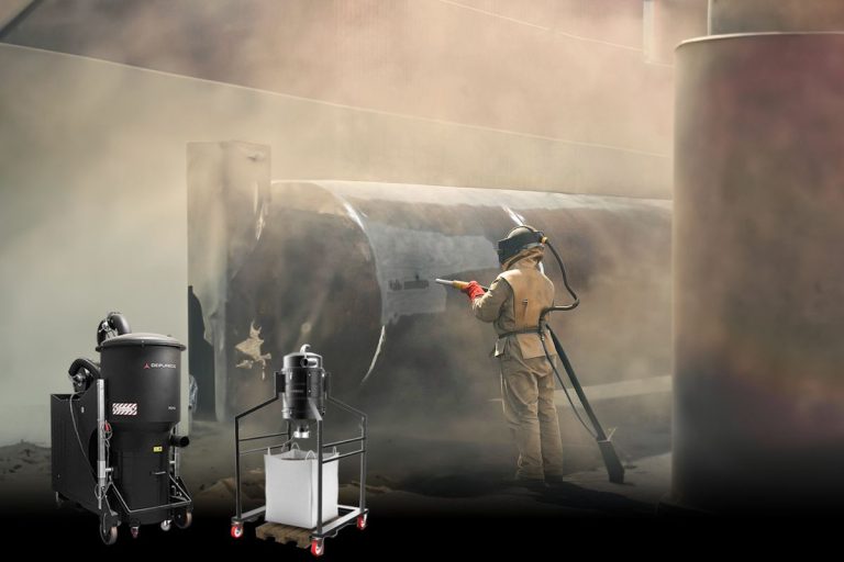 Industrial vacuum for sandblasting booth cleanup in a foundry