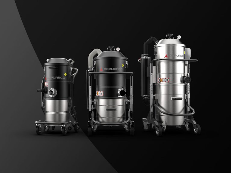 Lineup of ATEX-rated compressed-air (Venturi) industrial vacuums on wheeled frames with stainless and black housings.
