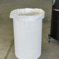 Removable perforated mesh basket and white filter bag for a Depureco trims and scraps pre-separator.